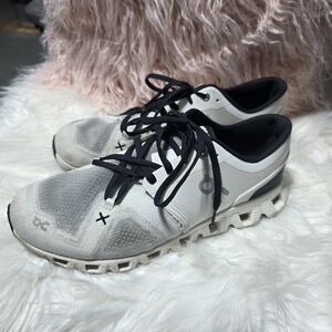 On Running White and Black Sneakers